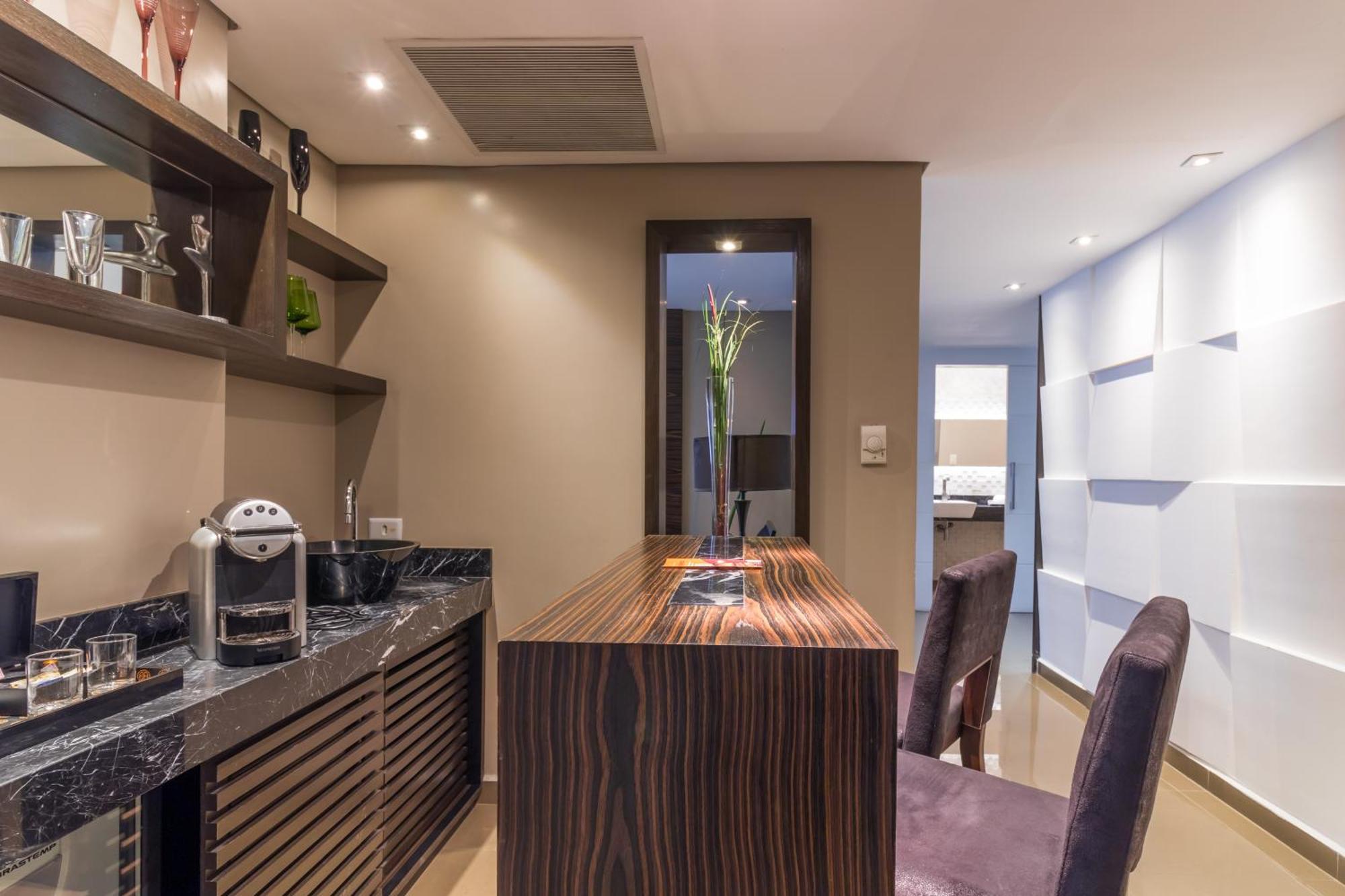 Parque Balneario Hotel Santos By Castelo Itaipava 外观 照片 A kitchen in a serviced apartment in Hong Kong